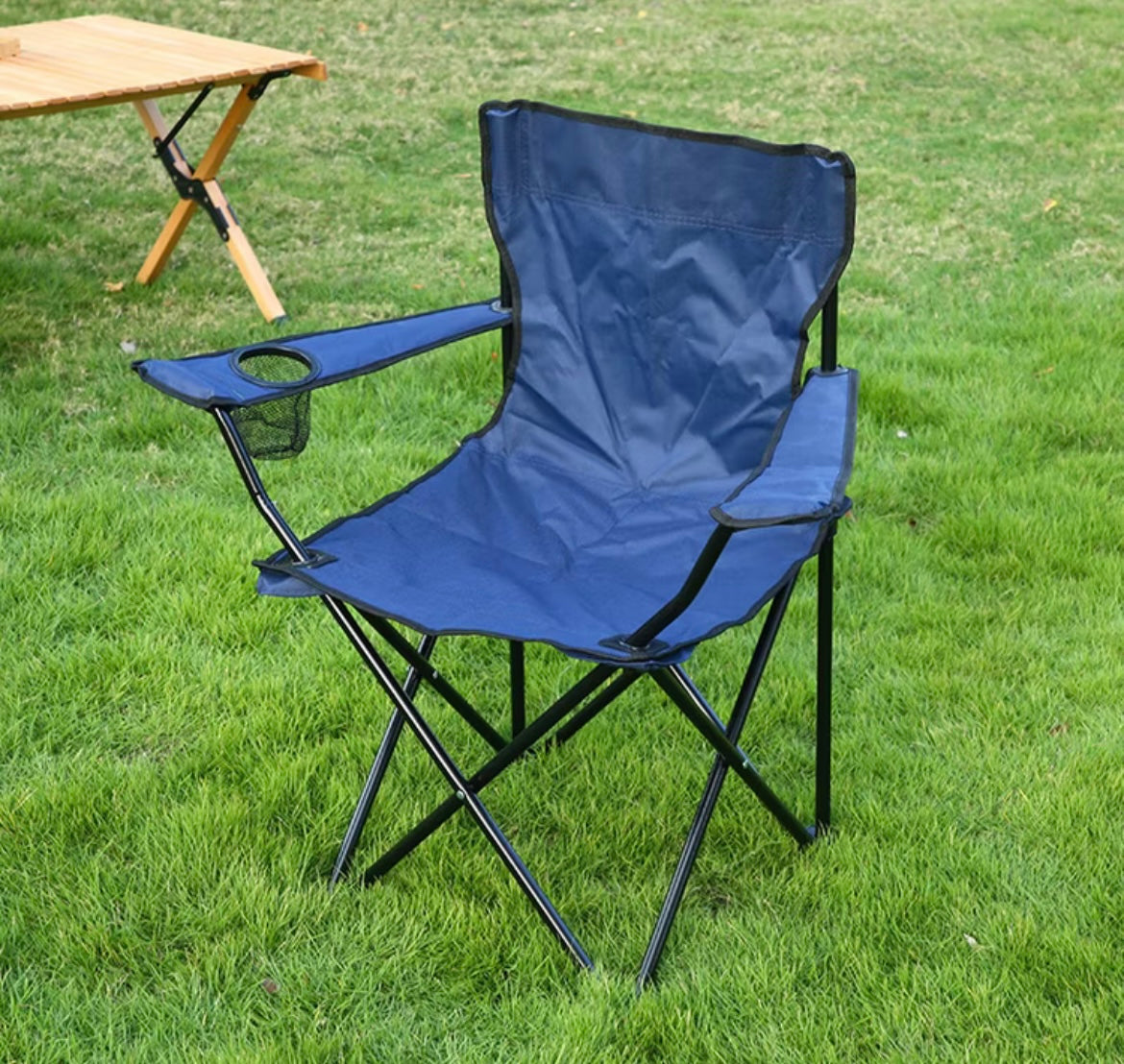 Folding camping chair with a Mesh cup holder built in